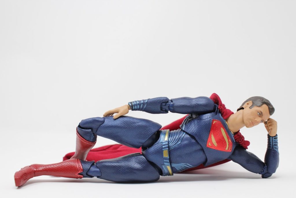 Superman toy lieing down