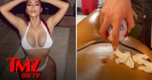 Kim Kardashian Gets 'SKIMS' Written On Oily Body With Whipped Cream | TMZ TV
